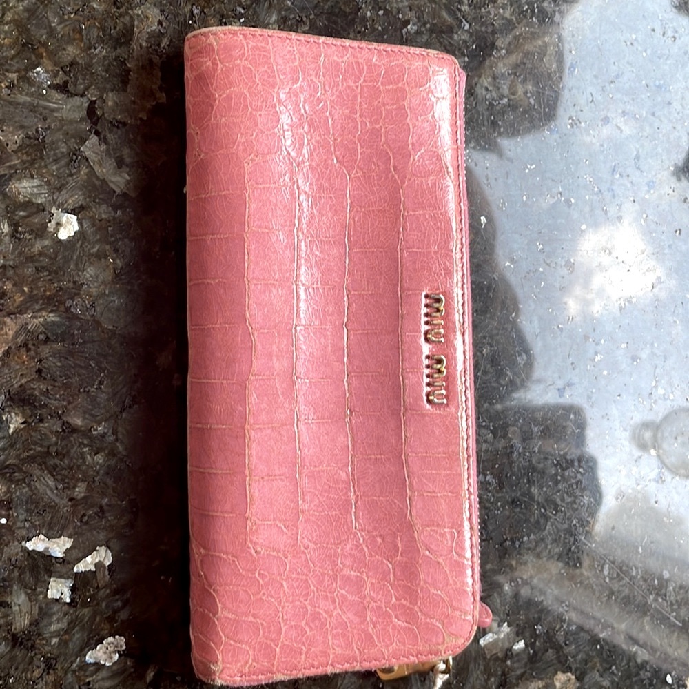 Miu Miu pink zippy wallet